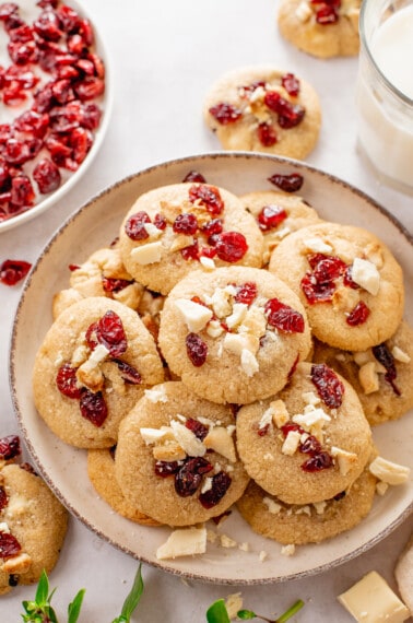 A plate of cranberry white chocolate chunk cookies.