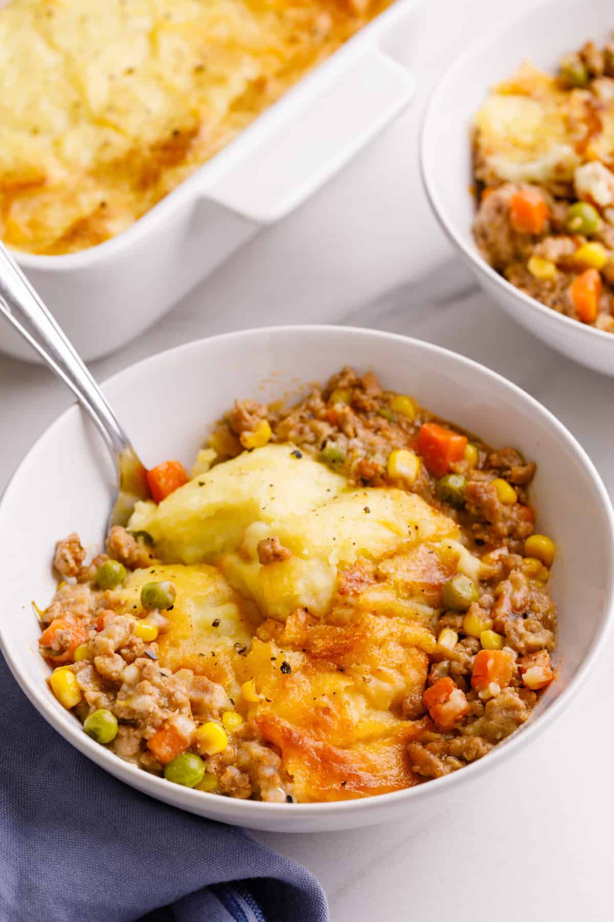 bowl of Shepherd's Pie with a spoon