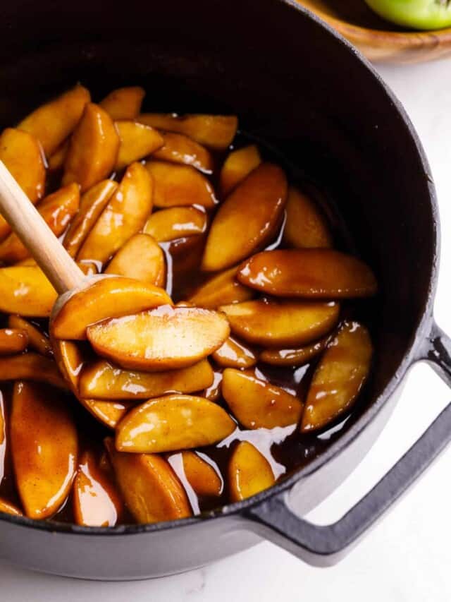 Overhead image of apple pie filling being stirred.
