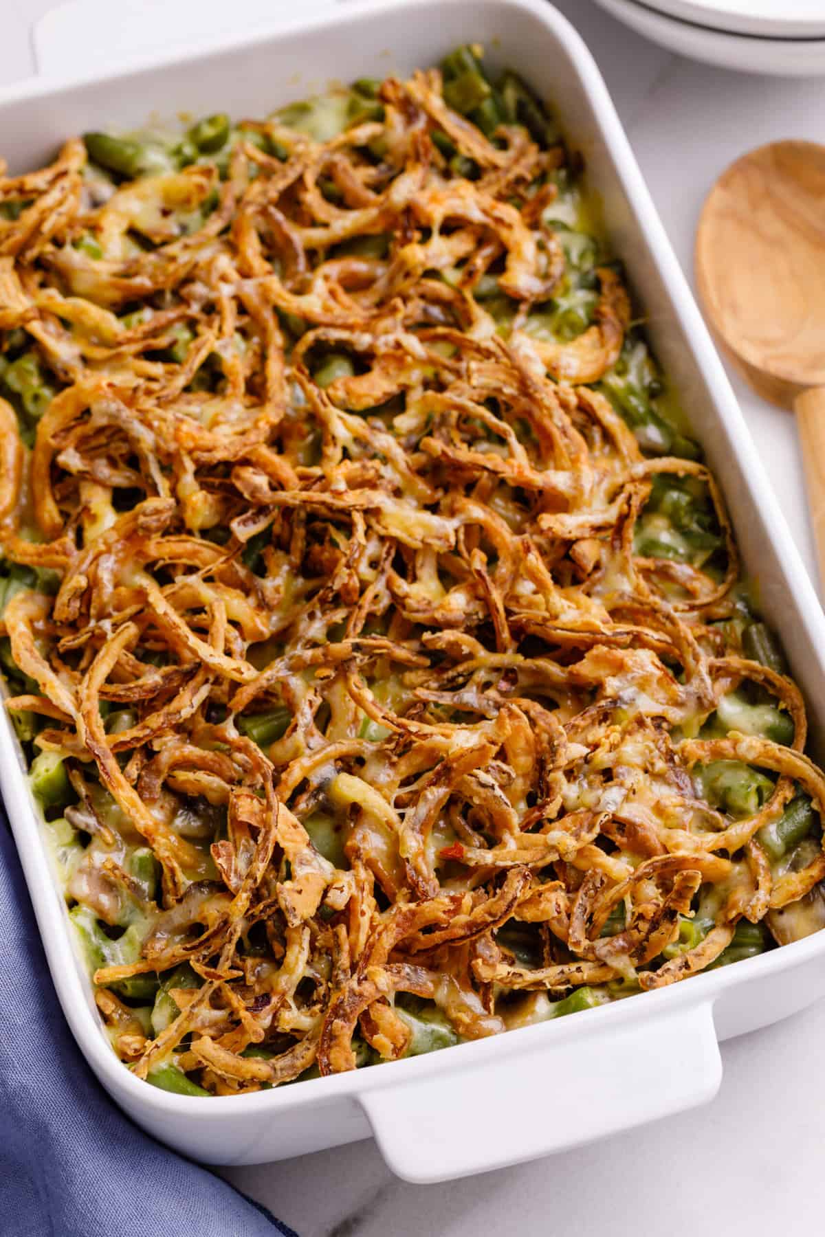 mushroom and onion green bean casserole served in a large baking dish
