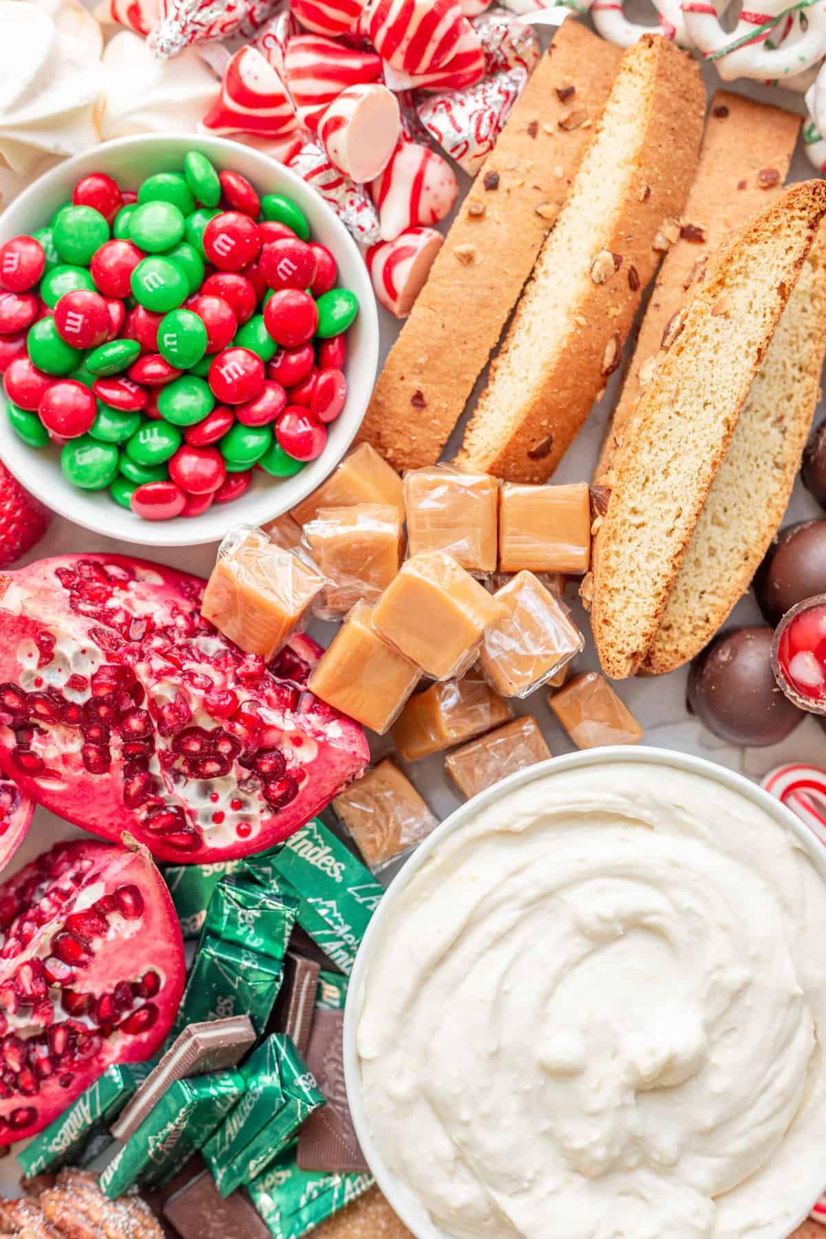 close up image of ingredients to build a christmas dessert charcuterie board.