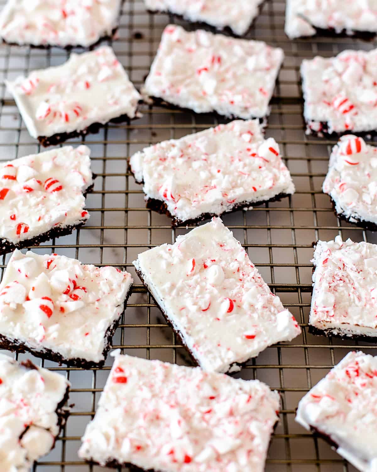 peppermint bark brownies on a wire cooling rack