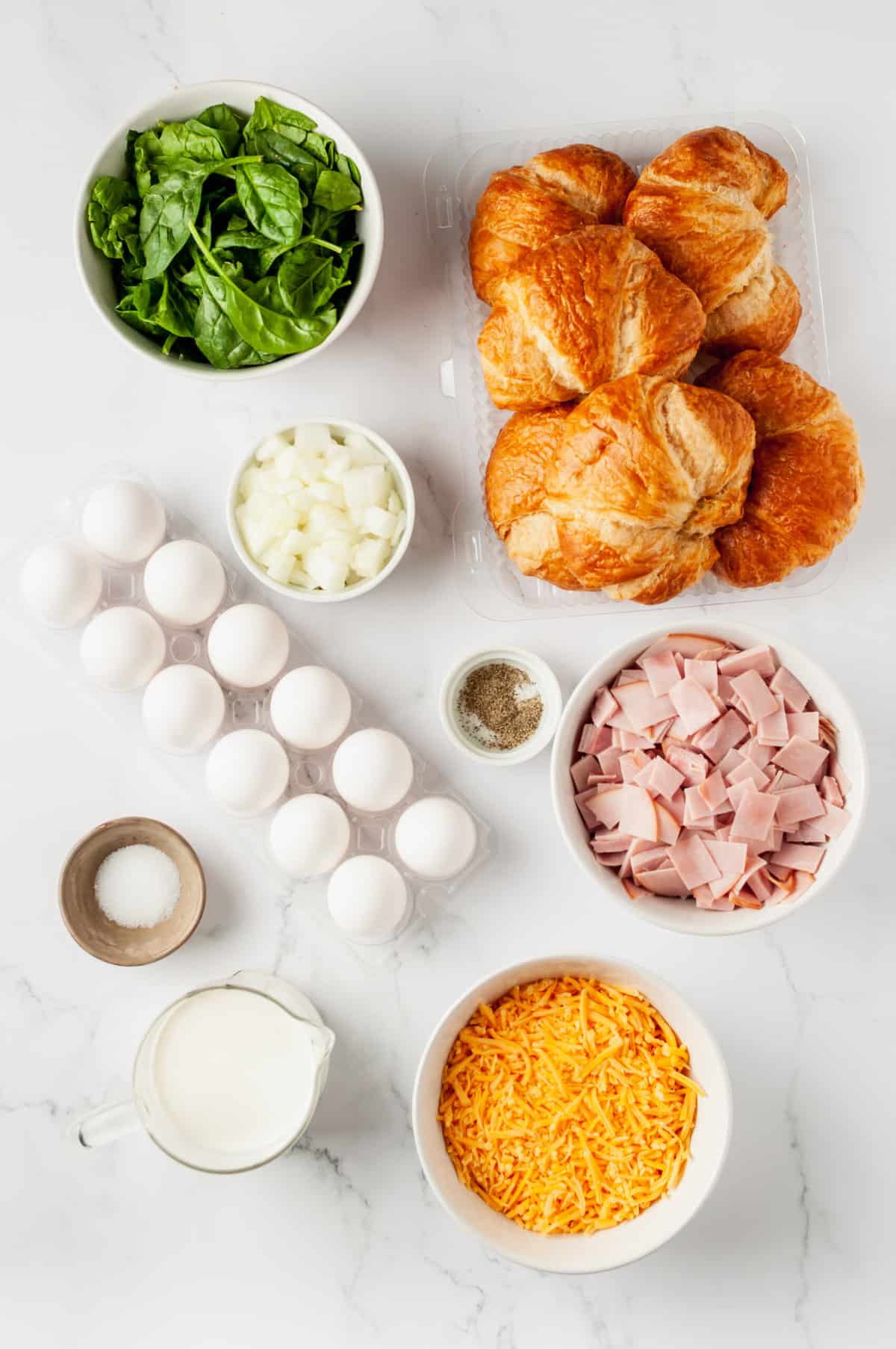 ingredients to make breakfast croissant casserole