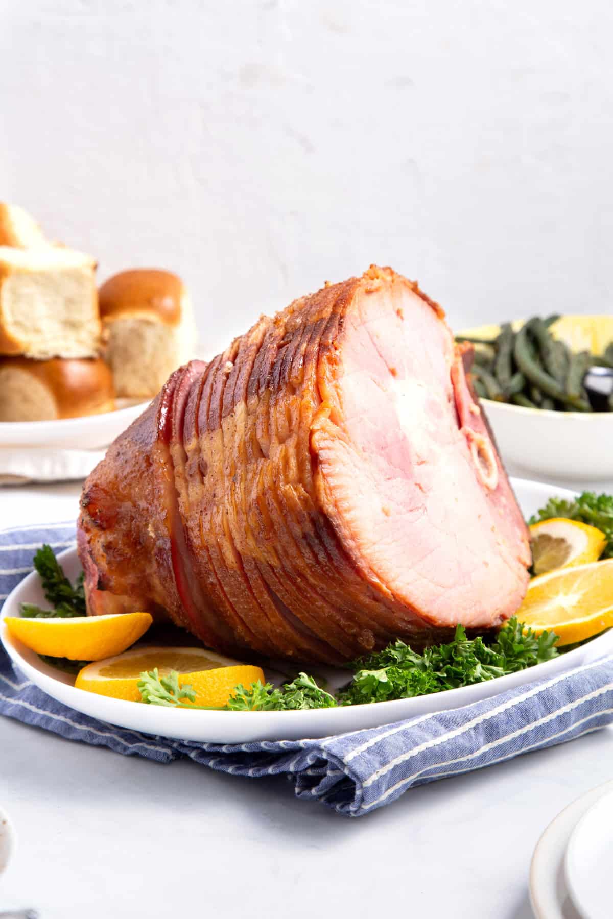 honey baked ham served on a bed of greens and fresh citrus