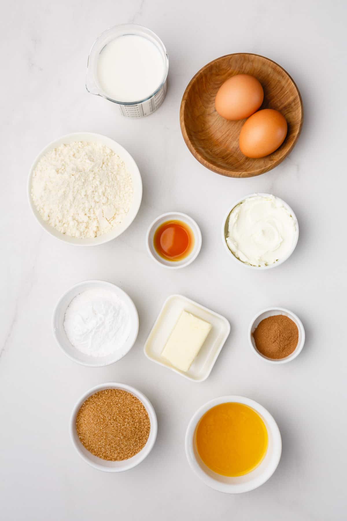 ingredients to make cinnamon roll pancakes with cream cheese frosting.