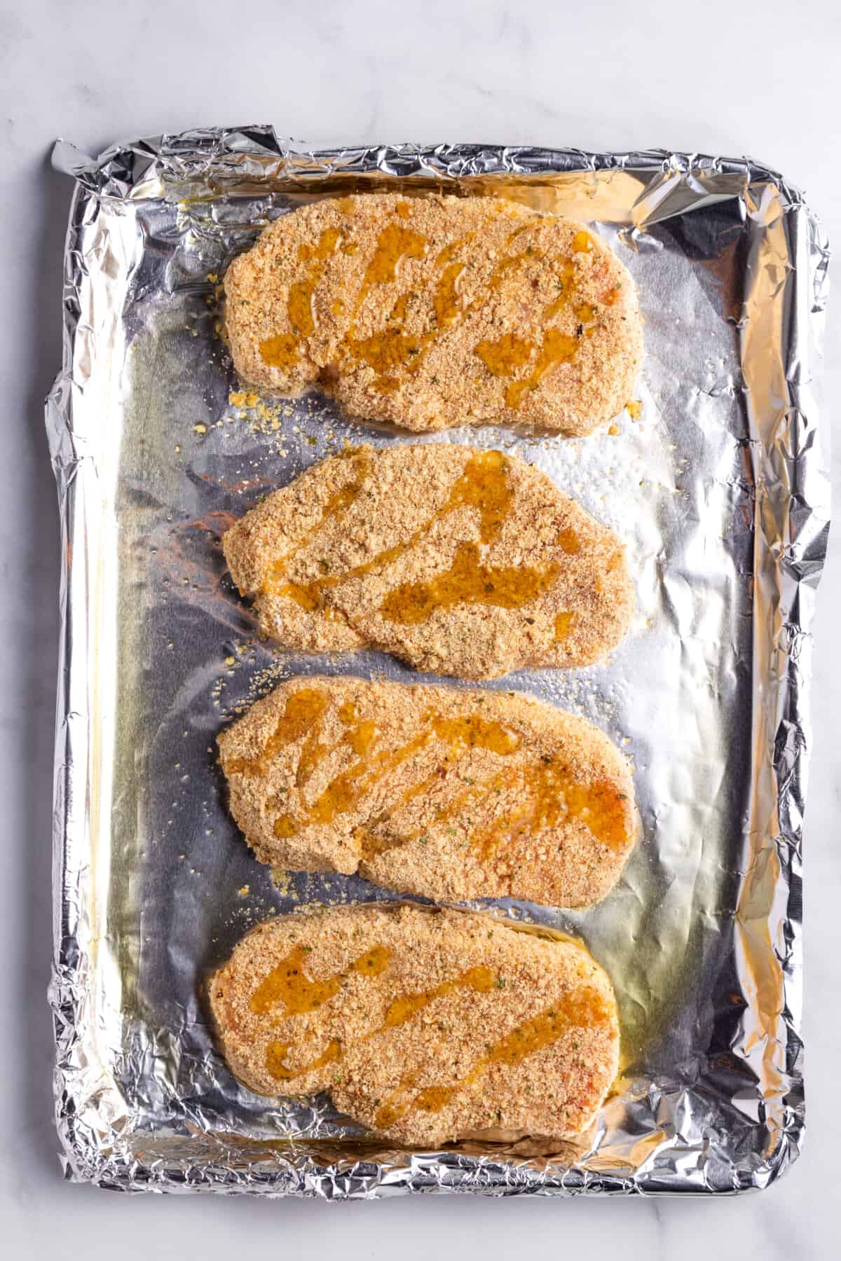 step 4 to make baked breaded pork chops.