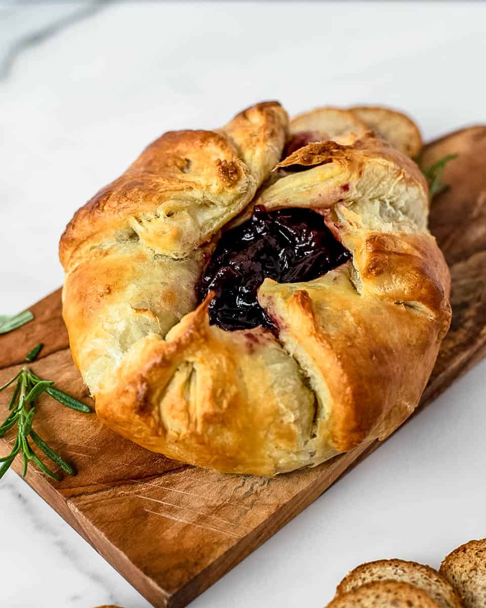 baked brie on a wooden board