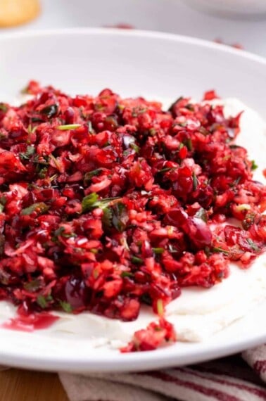 A bowl of cranberry jalapeño dip.