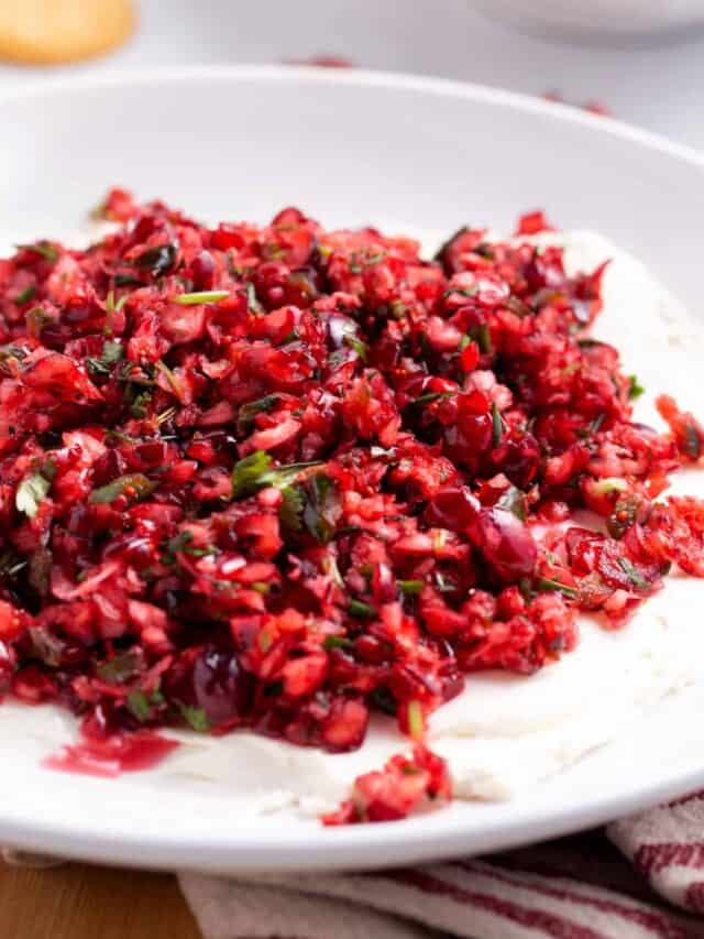 A bowl of cranberry jalapeño dip.