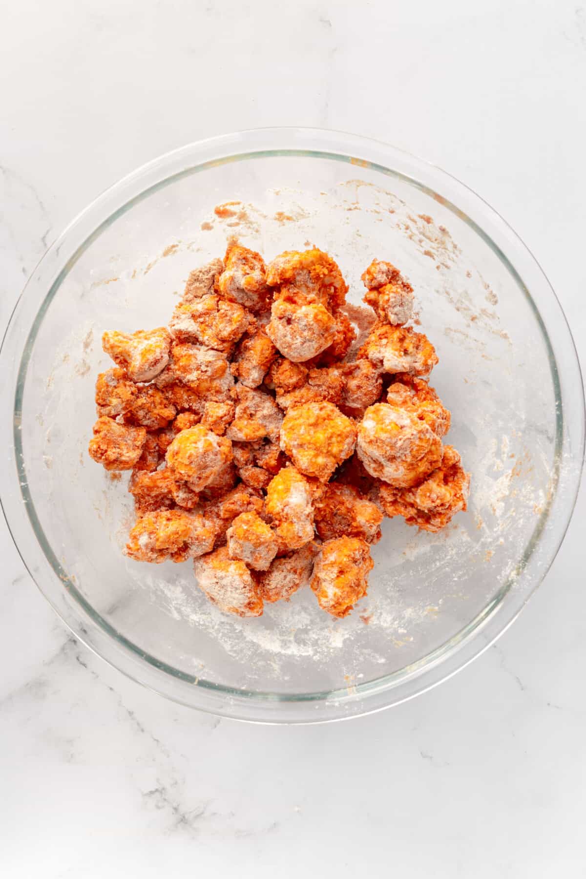 step 2 to make air fried buffalo cauliflower.