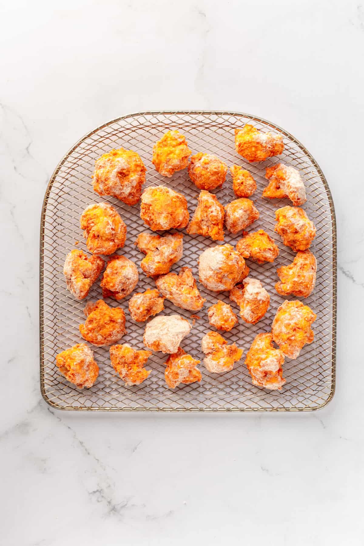 step 3 to make air fried buffalo cauliflower.