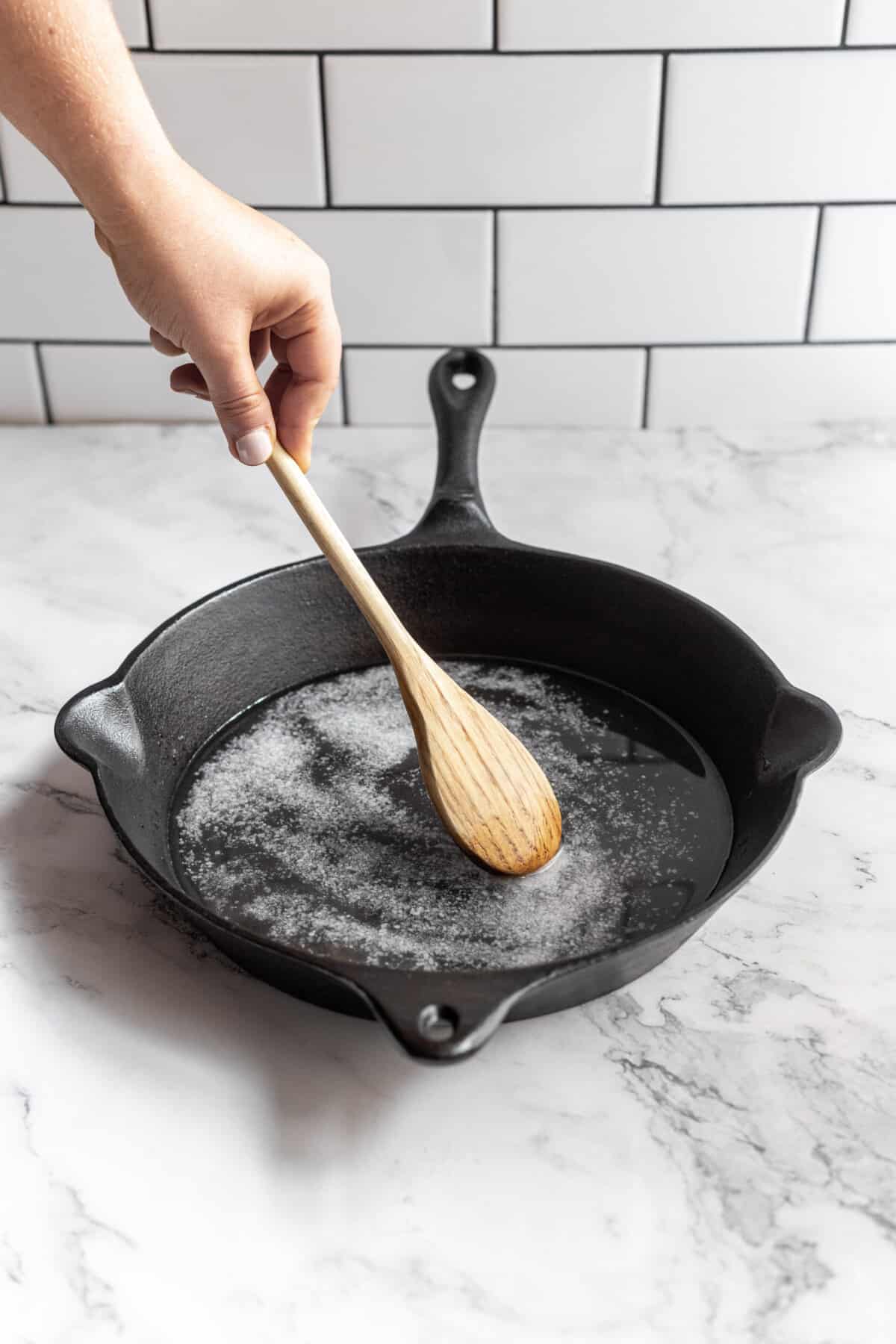 Use salt and oil create a paste that will remove the gunk.