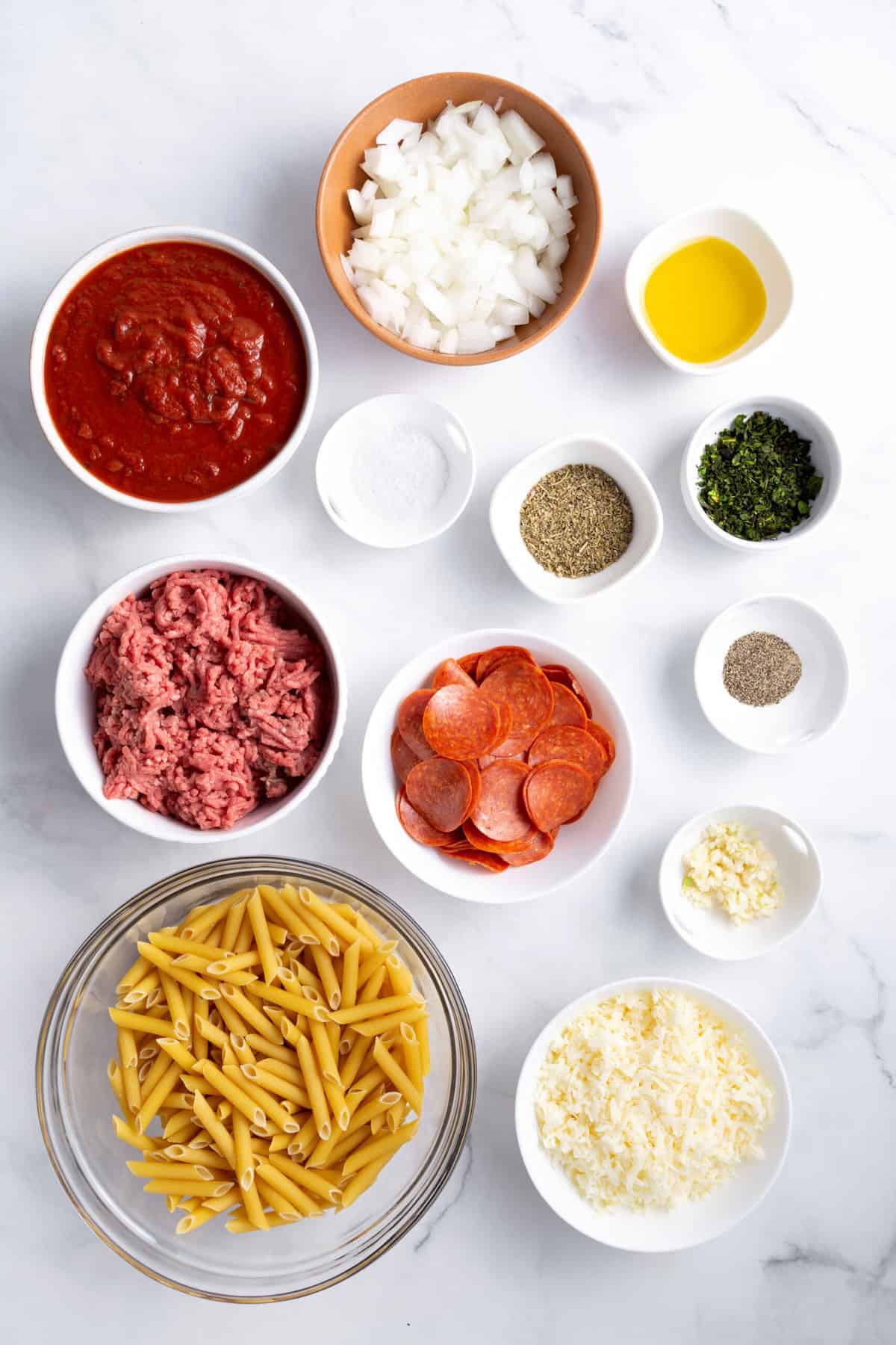 ingredients to make pizza casserole in a crockpot