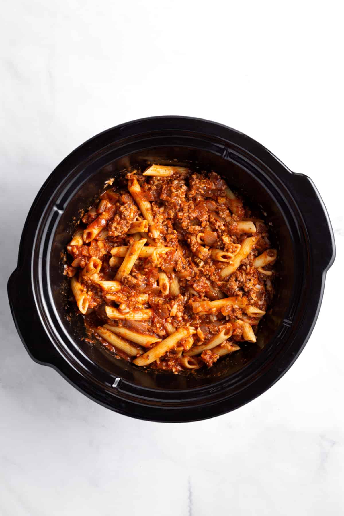 step 3 to make crockpot pizza casserole.