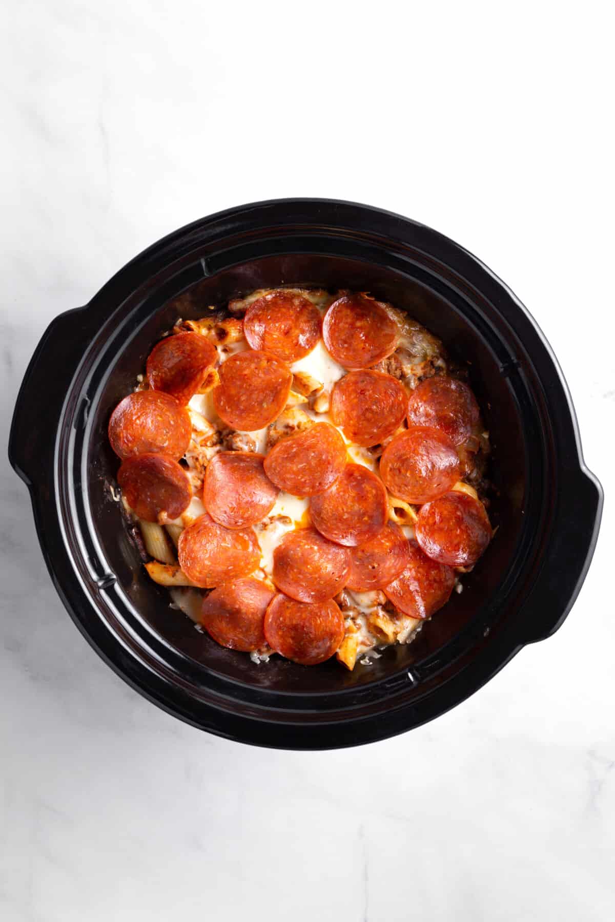 step 4 to make crockpot pizza casserole.