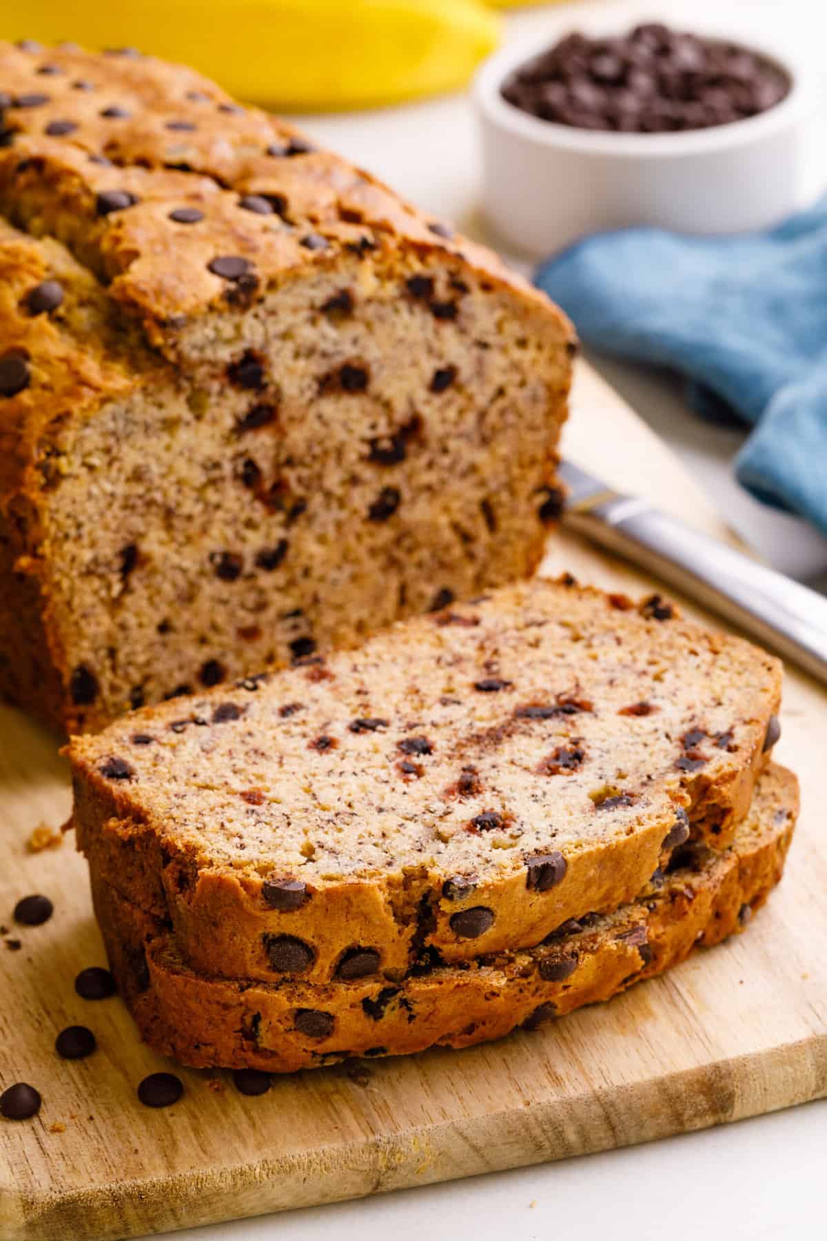 A cake mix banana bread loaf with two slices cut. 