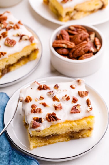 A slice of Honey Bun cake on a plate.