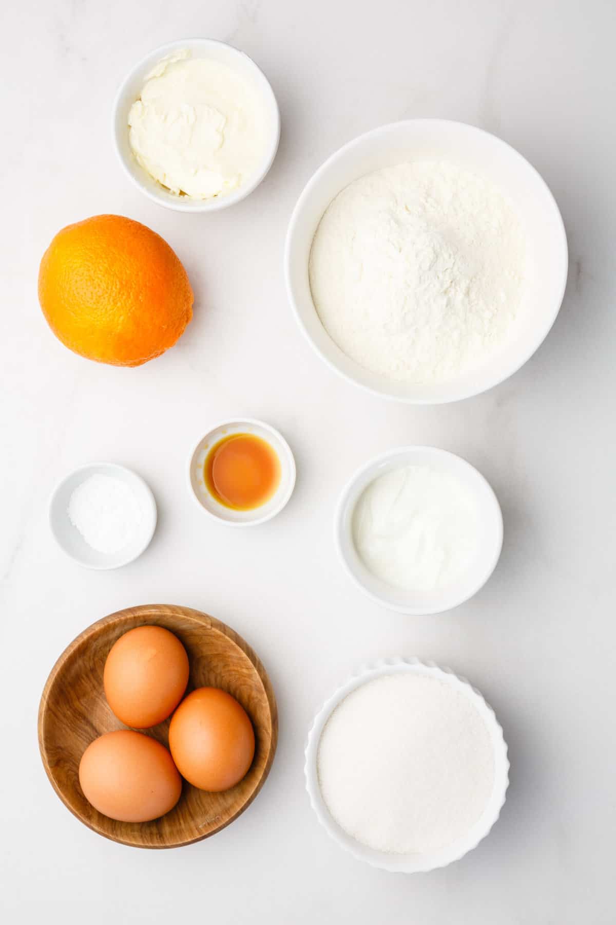 ingredients to make orange cake and orange glaze.