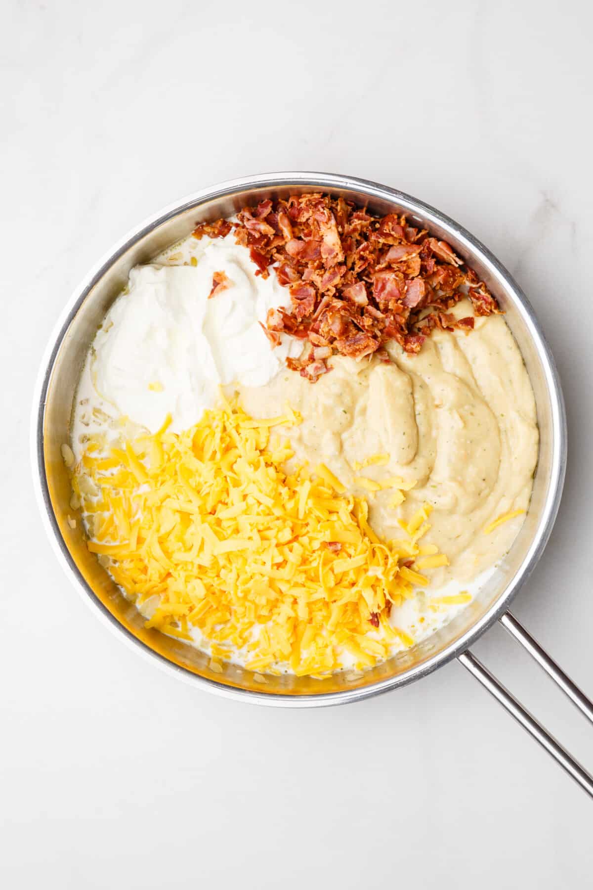 Step 1 to make pierogi casserole, prepare and make the sauce in a sauce pan.