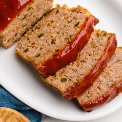 Sliced southern meatloaf on a plate.