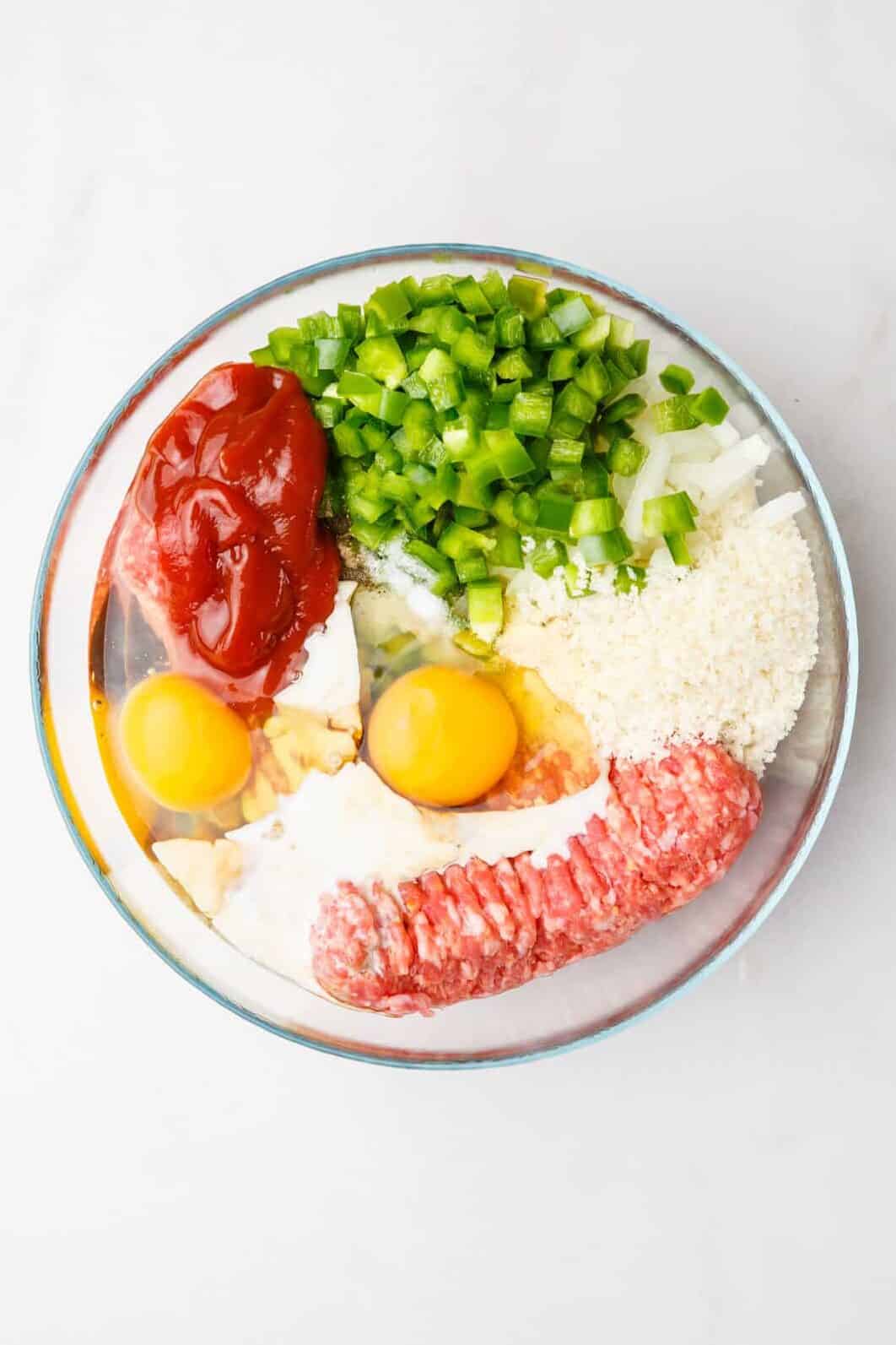 step 1 to make southern meatloaf, combine all the ingredients in a large glass bowl