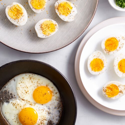 Plates of soft, hard, and fried eggs made in the air fryer.