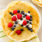 crepes with fresh berries and whipped cream.