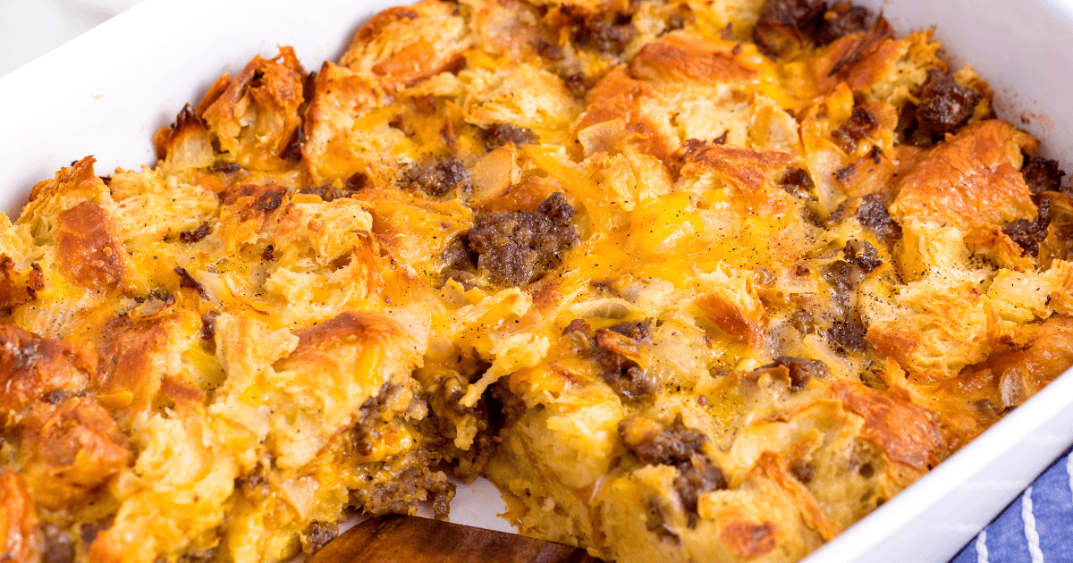 A baking dish of sausage croissant breakfast casserole.