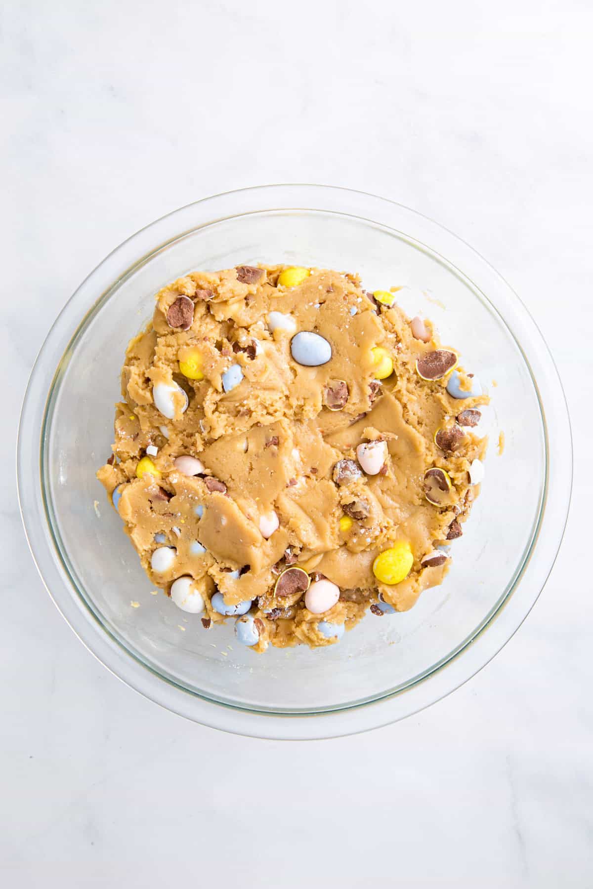 cadbury egg cookie dough in a large glass bowl