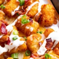 Loaded tater tots topped with bacon and Ranch.