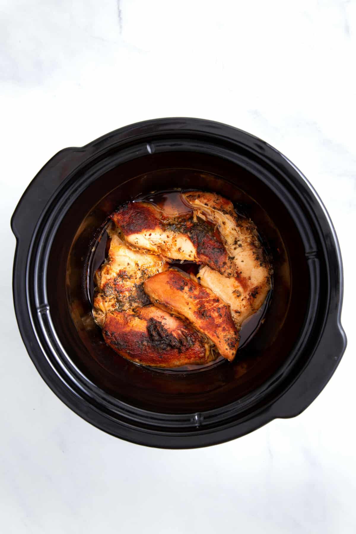 cooked chicken in a slow cooker
