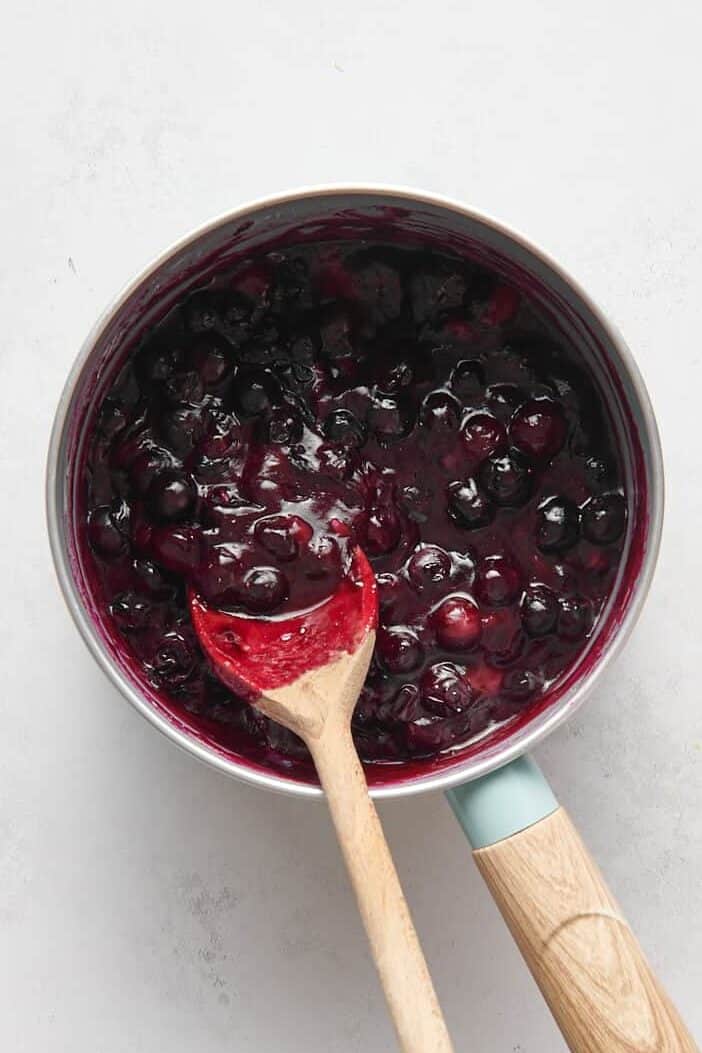 saucepan of blueberry filling for blueberry hand pies