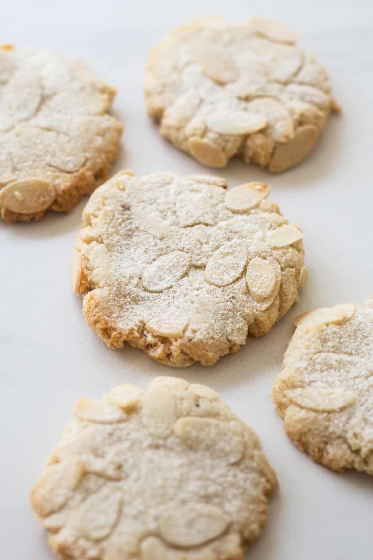 close up image of baked almond cookies.