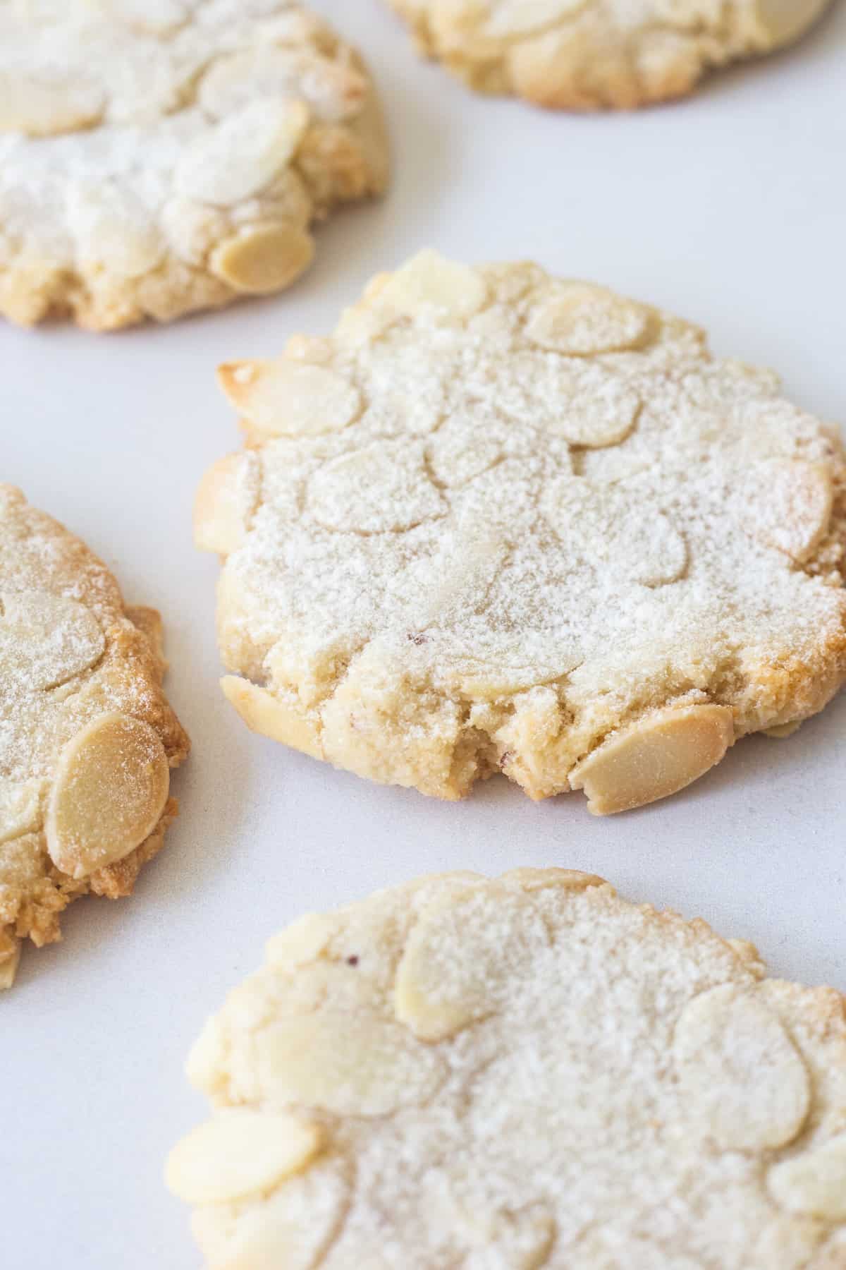 close up image of baked almond cookies.