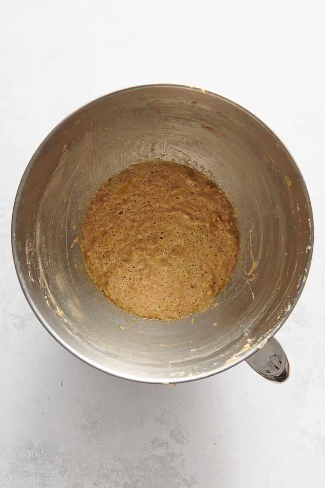 peach cake ingredients in a stainless steel mixing bowl