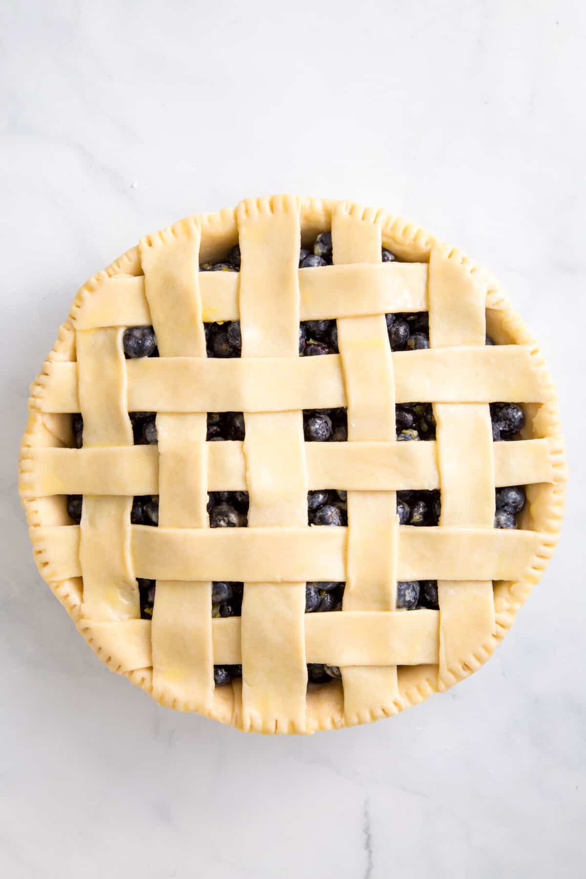 lattice design on a blueberry pie.