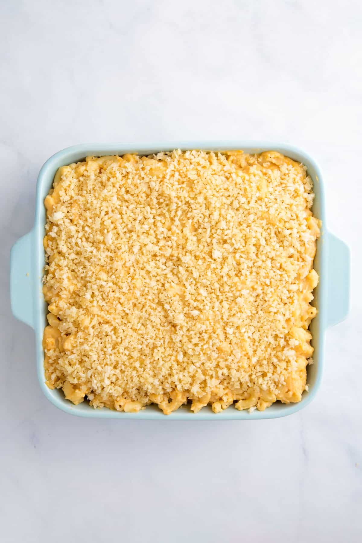 square casserole dish of southern baked mac and cheese