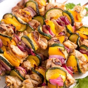 Grilled chicken skewers with veggies.