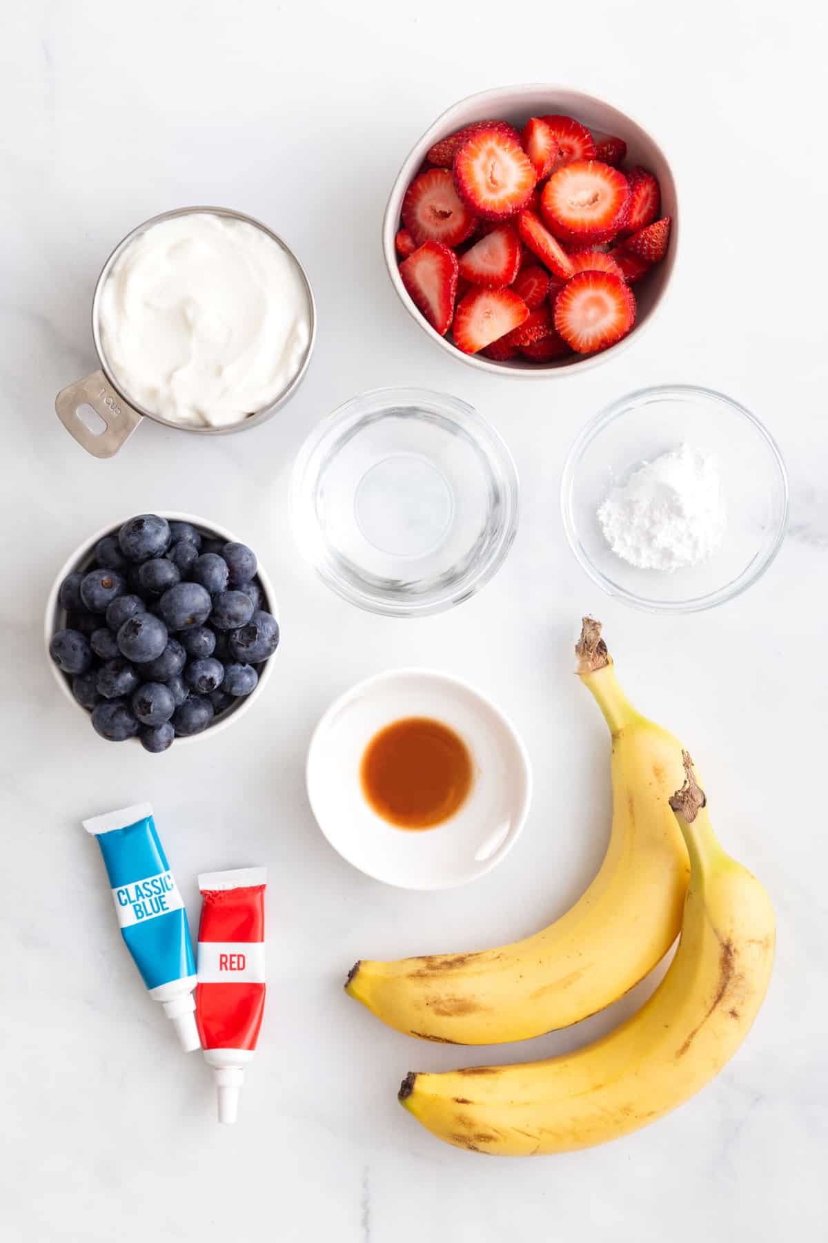 ingredients to make red, white and blue popsicles with fresh fruit