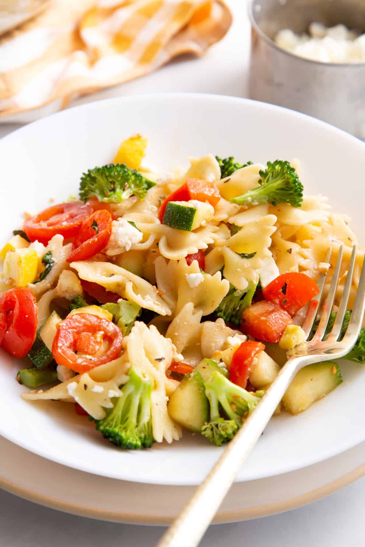 summer pasta salad plate of summer pasta salad and a fork.