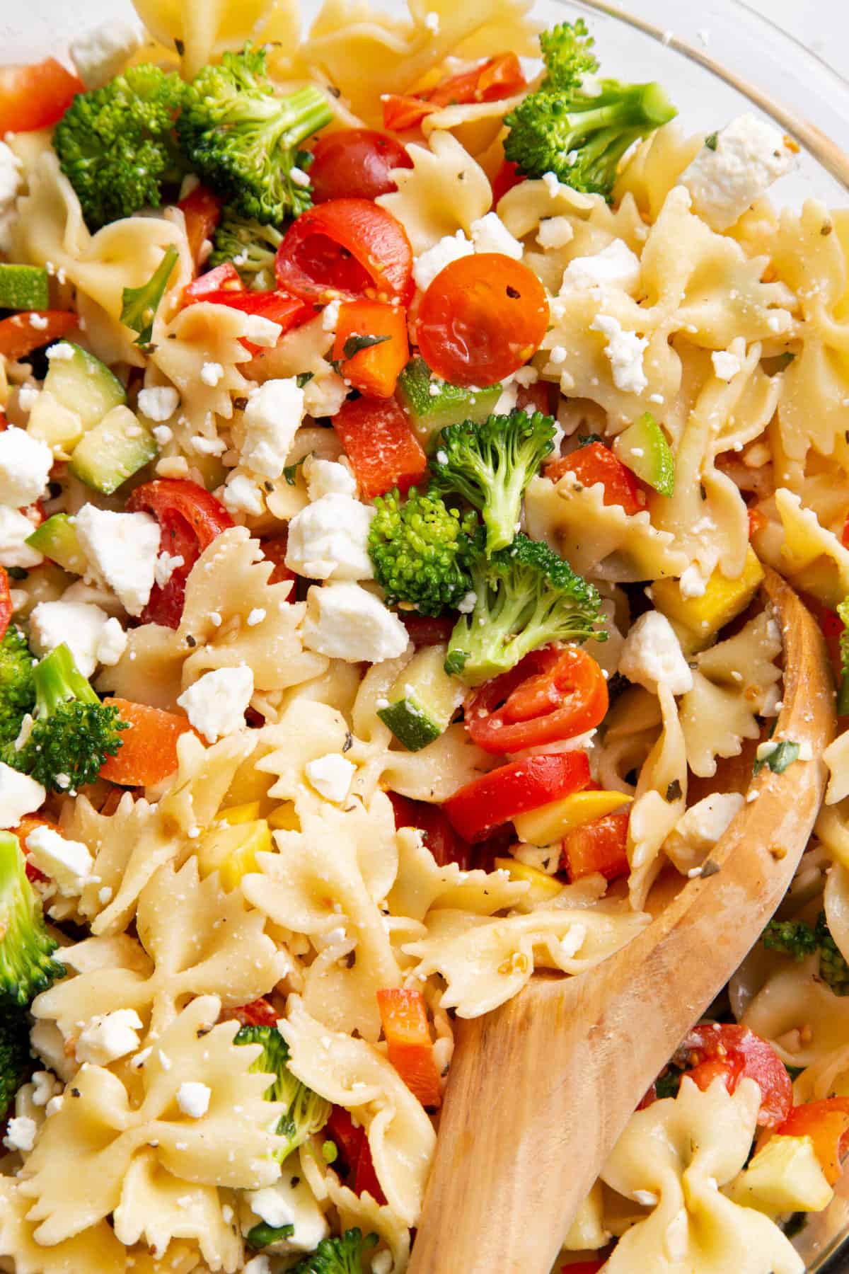 close up image of summer vegetable pasta salad