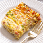 A slice of farmer's breakfast casserole on a plate.