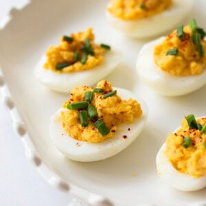 Classic deviled eggs on a plate.