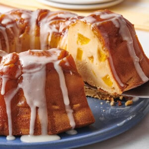 Peach cobbler pound cake with a slice missing.