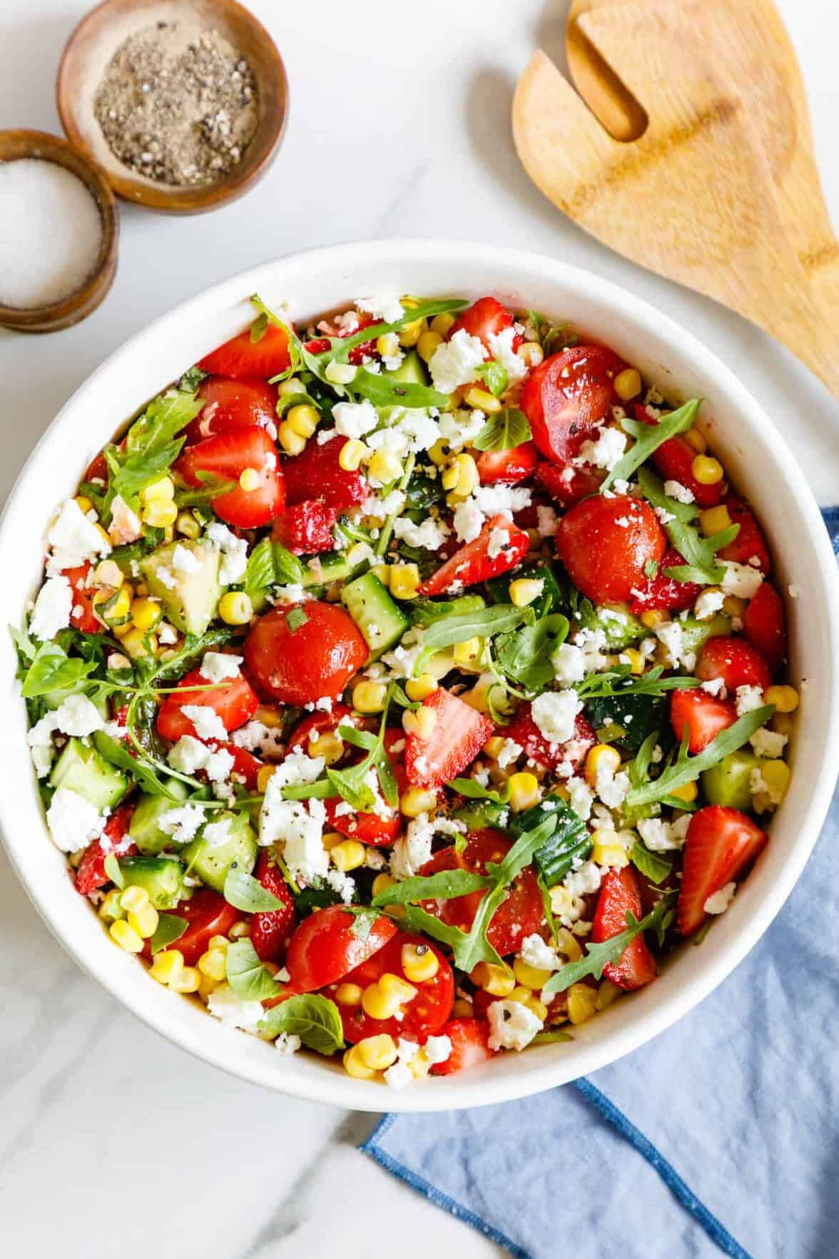 top down image of a large bowl of summer salad