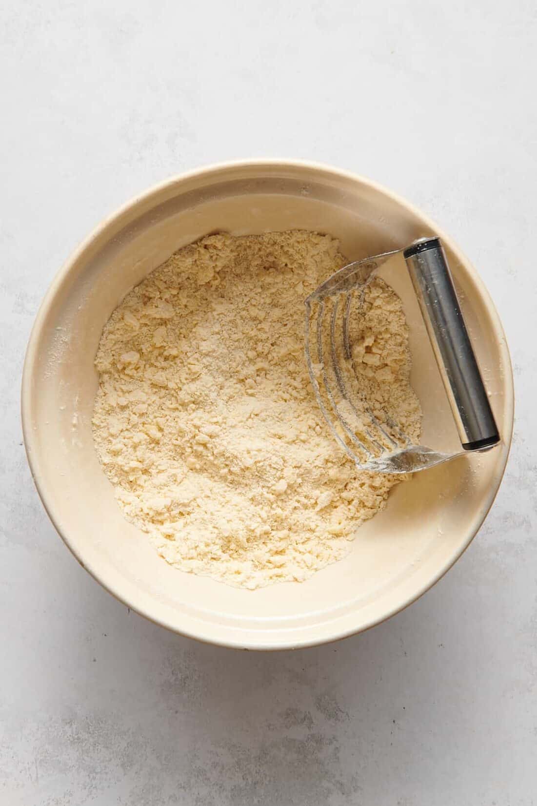 butter chopped into flour to make biscuit dough