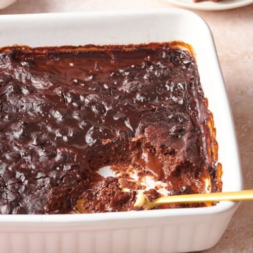 chocolate pudding cake with a serving missing.