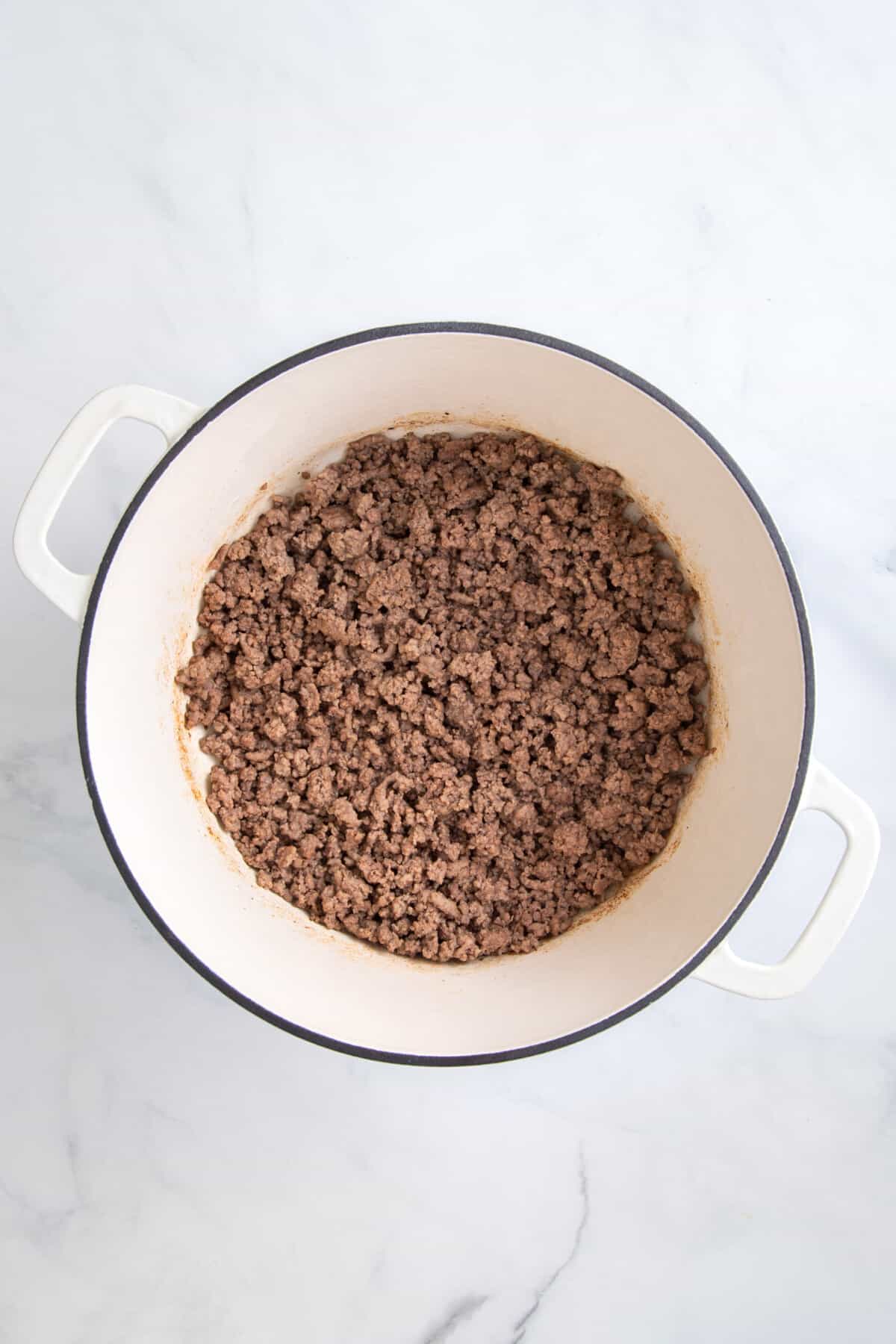 A pot of browned ground beef. 
