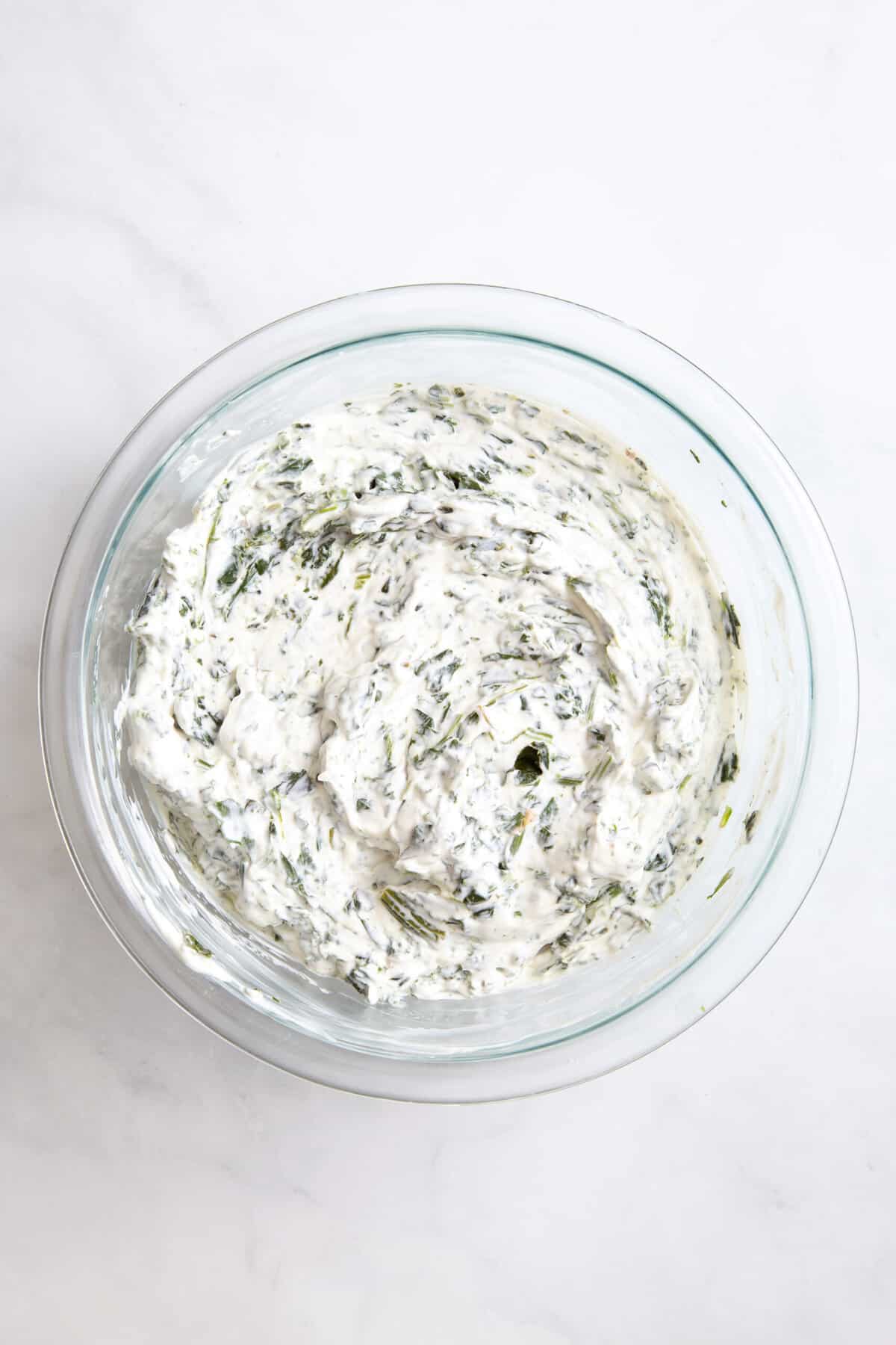 mayonnaise, sour cream, worcestershire sauce, knorr seasoning, salt and pepper stirred together in a large glass bowl