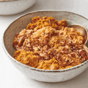 A bowl of pumpkin cobbler.